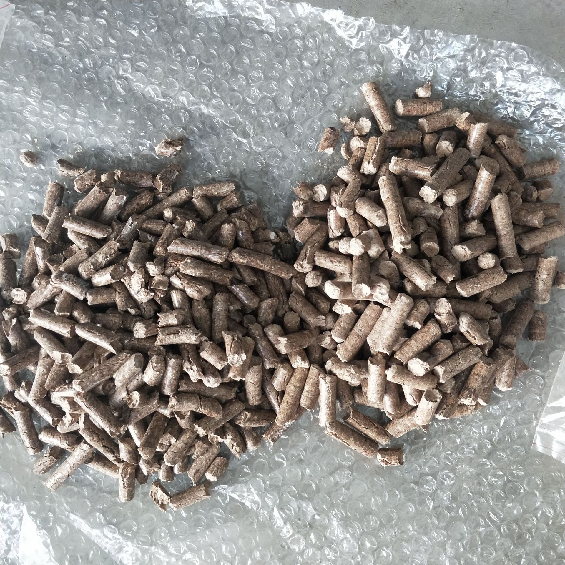 低碳环保木颗粒_/工厂销售生物质颗粒2000型木粉颗粒厂