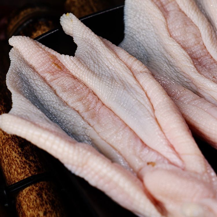 麻辣燙火鍋食材無骨鴨爪，,批發(fā)去骨冰鮮鴨掌 無骨鴨掌 新鮮冷凍無骨鴨爪廠家，