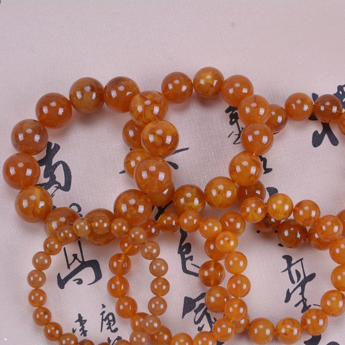 厂家直销 二代琥珀蜜蜡 精致柯巴手串显荧光浮水火机烧有松香